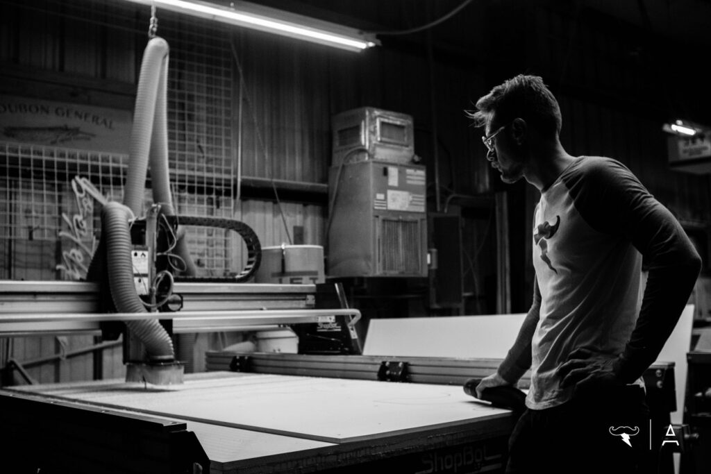 Josh at the CNC router. fabricating Heart Beacon