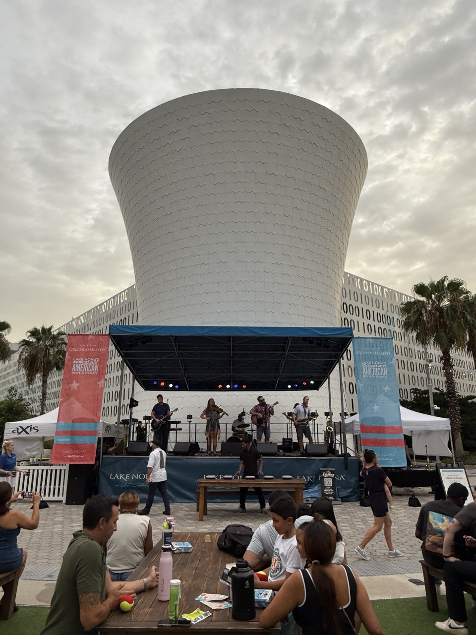 Live band performing at the base of the Beacon. Lake Nona's Great American Block Party