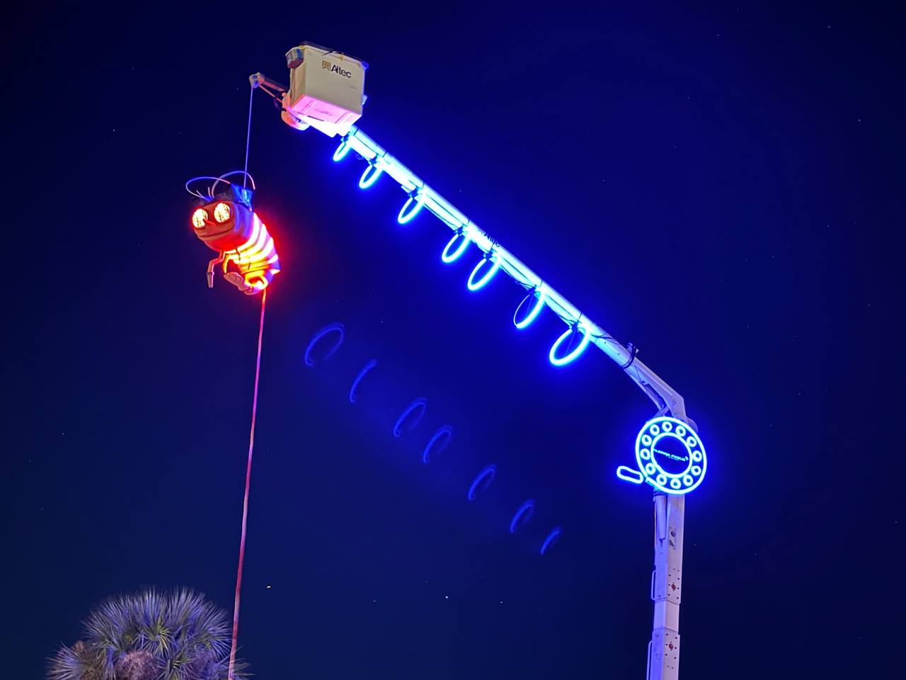 Shrimpy glowing on crane boom close-up