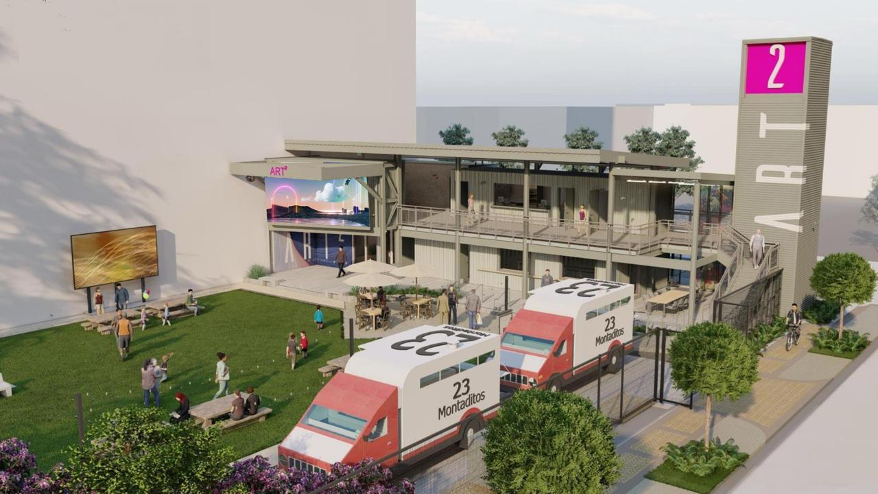 Art² Art Park aerial view with food trucks, stage, and LED wall