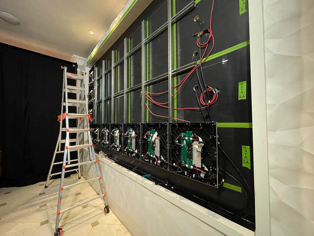 Behind the scenes. LED panel installation